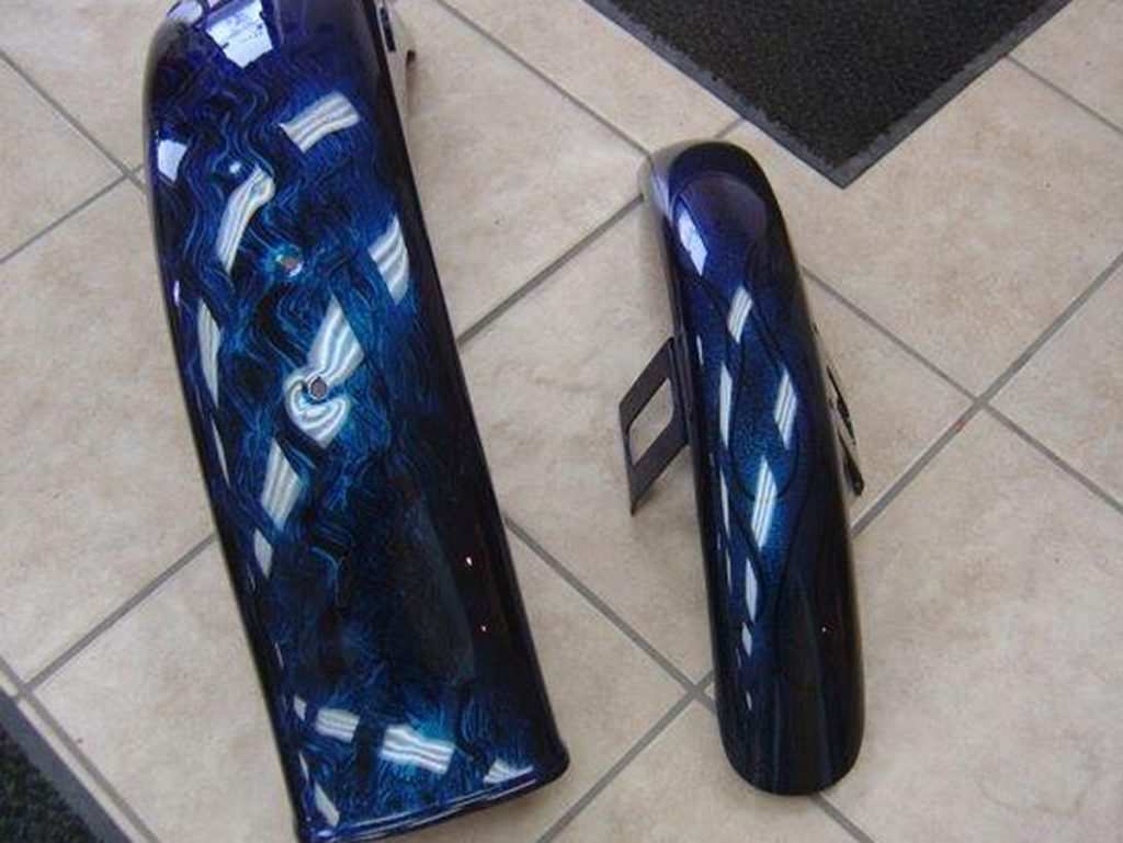 Custom motorcycle pieces with blue marble finish